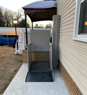 Vertical Platform Lift, for multilevel accessibility. - This installation was done for a veteran that recently received a scooter and was unable to get the unit in and out of the residence. Vertical Platform Lift, for multilevel accessibility. - This installation was done for a veteran that recently received a scooter and was unable to get the unit in and out of the residence.