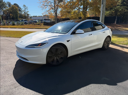 Tesla Window Tinting - Teslas demand a higher level of precision and performance when it comes to window tinting. Their large glass surfaces, panoramic roofs, unique electronics, and heat-sensitive interiors require advanced films and experienced installers. At Turbo Tint Marietta, we specialize in professional Tesla tinting designed to keep your EV cooler, protect your battery efficiency, and improve driving comfort—all while preserving the clean, modern look Tesla owners love.
🔥 Maximum Heat Rejection for EV Comfort & Efficiency
Tesla cabins heat up quickly due to expansive glass and large windshield angles. Our nano-ceramic tint delivers:
* Extreme infrared heat blocking
* 99% UV protection
* Reduced glare for safer driving
* Cooler cabin temperatures
* Less AC usage = improved range retention
Perfect for Atlanta summers and long commutes.
🛡️ Designed for Tesla Technology
Our films work flawlessly with Tesla’s advanced systems:
* No interference with LTE, Bluetooth, GPS, or WiFi
* No distortion on cameras or sensors
* Safe for autopilot hardware and cabin cameras
* Maintains clarity on large glass roof panels
We use precision-cut software patterns for a clean, seamless installation with no razor blades near your vehicle.
🚙 Full Tinting Options for Every Tesla Model
Model 3 & Model Y
* Full rear hatch glass tinting in one seamless piece
* Panoramic roof heat rejection
* Windshield ceramic tint for maximum cooling
* Side windows for uniform style and privacy
Model S & Model X
* Large windshield and front doors
* Rear doors and cargo glass
* Sunroofs and panoramic roofs
* Perfect tint matching for refresh models
Cybertruck
* Flat glass architecture with a futuristic design
* High-heat cabin due to large glass angles
* Ceramic windshield tint recommended
* Ultra-clean, stealth look with uniform shade options
✨ Why Tesla Owners Choose Us
* Specialized experience with all Tesla models
* Advanced nano-ceramic and dual-layer ceramic films
* 1-hour tint packages available
* Clean installs with no gaps, bubbles, or distortion
* Lifetime warranty options
* EV-friendly shop with spacious bays
We protect your Tesla while delivering the highest-performing tint available.
🔋 Perfect for Daily Drivers, Road-Trippers & Performance Owners
Whether you're preserving range, reducing heat, improving privacy, or customizing the look of your Tesla, our tint packages provide industry-leading results.
📍 Serving Tesla Owners Across Metro Atlanta
Marietta, Kennesaw, Smyrna, Vinings, Roswell, Woodstock, Acworth, Powder Springs, Atlanta & surrounding cities. Tesla Window Tinting - Teslas demand a higher level of precision and performance when it comes to window tinting. Their large glass surfaces, panoramic roofs, unique electronics, and heat-sensitive interiors require advanced films and experienced installers. At Turbo Tint Marietta, we specialize in professional Tesla tinting designed to keep your EV cooler, protect your battery efficiency, and improve driving comfort—all while preserving the clean, modern look Tesla owners love.
🔥 Maximum Heat Rejection for EV Comfort & Efficiency
Tesla cabins heat up quickly due to expansive glass and large windshield angles. Our nano-ceramic tint delivers:
* Extreme infrared heat blocking
* 99% UV protection
* Reduced glare for safer driving
* Cooler cabin temperatures
* Less AC usage = improved range retention
Perfect for Atlanta summers and long commutes.
🛡️ Designed for Tesla Technology
Our films work flawlessly with Tesla’s advanced systems:
* No interference with LTE, Bluetooth, GPS, or WiFi
* No distortion on cameras or sensors
* Safe for autopilot hardware and cabin cameras
* Maintains clarity on large glass roof panels
We use precision-cut software patterns for a clean, seamless installation with no razor blades near your vehicle.
🚙 Full Tinting Options for Every Tesla Model
Model 3 & Model Y
* Full rear hatch glass tinting in one seamless piece
* Panoramic roof heat rejection
* Windshield ceramic tint for maximum cooling
* Side windows for uniform style and privacy
Model S & Model X
* Large windshield and front doors
* Rear doors and cargo glass
* Sunroofs and panoramic roofs
* Perfect tint matching for refresh models
Cybertruck
* Flat glass architecture with a futuristic design
* High-heat cabin due to large glass angles
* Ceramic windshield tint recommended
* Ultra-clean, stealth look with uniform shade options
✨ Why Tesla Owners Choose Us
* Specialized experience with all Tesla models
* Advanced nano-ceramic and dual-layer ceramic films
* 1-hour tint packages available
* Clean installs with no gaps, bubbles, or distortion
* Lifetime warranty options
* EV-friendly shop with spacious bays
We protect your Tesla while delivering the highest-performing tint available.
🔋 Perfect for Daily Drivers, Road-Trippers & Performance Owners
Whether you're preserving range, reducing heat, improving privacy, or customizing the look of your Tesla, our tint packages provide industry-leading results.
📍 Serving Tesla Owners Across Metro Atlanta
Marietta, Kennesaw, Smyrna, Vinings, Roswell, Woodstock, Acworth, Powder Springs, Atlanta & surrounding cities.
