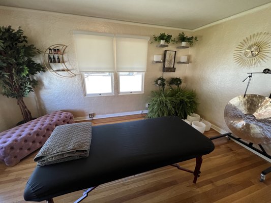 The Sun Room: The Healing Studio at Amethyst House - Be immersed in an environment full of natural plant therapy and a cleansing stream of healing waters. The space is highlighted in high vibration golds with pops of pink and green to place the client in the vibration of unconditional love during healing sessions. All healing environments at Amethyst House are designed with color, sound and aromatherapy in mind in addition to the psychology and Feng Shui of space. The Sun Room: The Healing Studio at Amethyst House - Be immersed in an environment full of natural plant therapy and a cleansing stream of healing waters. The space is highlighted in high vibration golds with pops of pink and green to place the client in the vibration of unconditional love during healing sessions. All healing environments at Amethyst House are designed with color, sound and aromatherapy in mind in addition to the psychology and Feng Shui of space.