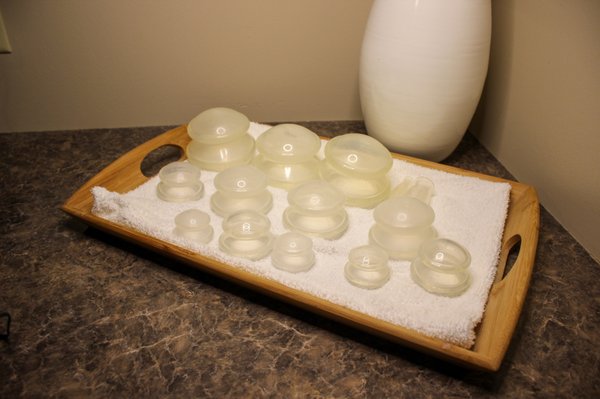 Cupping - What is Cupping Massage?
----------------
Cupping is a traditional Chinese technique that relies on negative pressure, creating suction on the skin, as opposed to the tissue compression techniques that are normally used during a massage.

Why is Cupping Massage Beneficial?
-----------------
Suction cups are used to pull blood to the surface of the skin, which is thought to improve circulation and promote healing. Cupping therapy helps relieve aching muscles, releases joint stiffness, and may reduce inflammation for a variety of acute and chronic conditions.

During your session, a therapist will position a suction cup over specific treatment areas, producing a vacuum effect that helps improve overall circulation. Lie back, take a deep breath and enjoy the feeling of deep relaxation as it spreads throughout your entire body.

Curious? Cupping is a healing and rejuvenating therapy best experienced first-hand. Try something different and add this age-old practice to your next massage.
