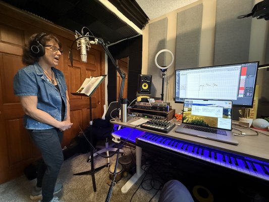 Voice Student's Full Length Cover Album - I've quoted an excerpt from the client about her experience creating a full length cover album at K. Rose Studios below. The project took just under 80hrs start to finish and was quoted at $75/hr. Every aspect was done in house included the album artwork, then we shipped out the tracks and art to a company to have them printed as physical copies for friends and family.
Here is the client excerpt:
"My son passed away two years ago. Last December I was thinking of a way to honor him and the idea of recording a CD of songs that I could sing to him came into my mind. Up until then my singing had been confined to my basement. I made a few phone calls to recording studios in my area. After speaking with Kevin, I decided to meet him and discuss this idea. I went to his studio and he explained the process of putting together a ten song CD and what it would entail. Kevin was so encouraging, positive, and enthusiastic about my project that he made me believe it was doable. So, he gave me my first vocal exercises and the journey began!!
I think I could write a book on how amazing the entire experience was working with Kevin for six months – he provided me with an emotionally safe environment to sing to my son. He treated me with kindness and respect. There were days when it was very difficult, almost impossible to sing in the studio. But Kevin’s patience and encouragement and awesome vocal coaching got me through. It got easier as time passed. Kevin is so comfortable to work with. He gives instruction with positive reinforcement which really helps build self-confidence!!
Kevin is vastly talented. He is all things musical rolled into one! His singing voice is so beautiful. He graced my CD with his voice on a duet I asked him to sing lead on. He is a great songwriter, vocal instructor, plays many different instruments, has his own recording studio, and is a touring musician in his own band!! Kevin also helped me with his graphic design skills to create the jacket for the CD which includes a photo collage. He does it all, and I know it was serendipitous that I was led to him! With his help and guidance, I have a tangible and lasting musical tribute to my son that I will cherish and share with others……
And the best part is that because of Kevin, I have music and singing back in my life. I am going to continue to take singing lessons from him and feel ready to sing for fun again.
Thank you Kevin!!!!" Voice Student's Full Length Cover Album - I've quoted an excerpt from the client about her experience creating a full length cover album at K. Rose Studios below. The project took just under 80hrs start to finish and was quoted at $75/hr. Every aspect was done in house included the album artwork, then we shipped out the tracks and art to a company to have them printed as physical copies for friends and family.
Here is the client excerpt:
"My son passed away two years ago. Last December I was thinking of a way to honor him and the idea of recording a CD of songs that I could sing to him came into my mind. Up until then my singing had been confined to my basement. I made a few phone calls to recording studios in my area. After speaking with Kevin, I decided to meet him and discuss this idea. I went to his studio and he explained the process of putting together a ten song CD and what it would entail. Kevin was so encouraging, positive, and enthusiastic about my project that he made me believe it was doable. So, he gave me my first vocal exercises and the journey began!!
I think I could write a book on how amazing the entire experience was working with Kevin for six months – he provided me with an emotionally safe environment to sing to my son. He treated me with kindness and respect. There were days when it was very difficult, almost impossible to sing in the studio. But Kevin’s patience and encouragement and awesome vocal coaching got me through. It got easier as time passed. Kevin is so comfortable to work with. He gives instruction with positive reinforcement which really helps build self-confidence!!
Kevin is vastly talented. He is all things musical rolled into one! His singing voice is so beautiful. He graced my CD with his voice on a duet I asked him to sing lead on. He is a great songwriter, vocal instructor, plays many different instruments, has his own recording studio, and is a touring musician in his own band!! Kevin also helped me with his graphic design skills to create the jacket for the CD which includes a photo collage. He does it all, and I know it was serendipitous that I was led to him! With his help and guidance, I have a tangible and lasting musical tribute to my son that I will cherish and share with others……
And the best part is that because of Kevin, I have music and singing back in my life. I am going to continue to take singing lessons from him and feel ready to sing for fun again.
Thank you Kevin!!!!"