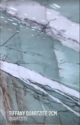 Quartzite - Pure quartzite is usually white or gray, but it can also be pink, red, yellow, green, blue, or orange, depending on the minerals present. 

Quartzite is hard, dense, and strong, and it's resistant to weathering and abrasion. It's also more resistant to chemicals than marble, which has a similar color palette and veining. 
Uses
Quartzite is often used in construction for walls and flooring, and it's a popular choice for kitchen countertops.
 We don’t require appointments to visit Aracruz RE.
Visit us or call @
602-853-3519