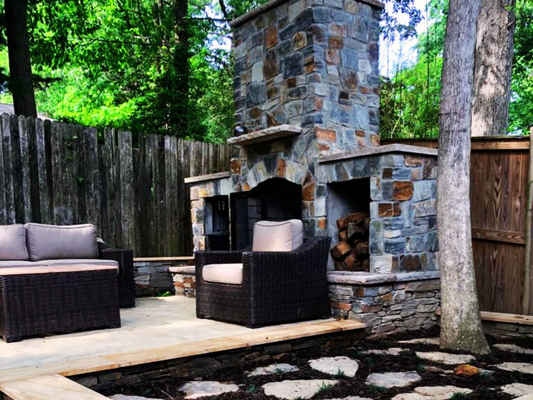 Steps, Fire Place, Stone Walkway, Fire Pit, Patio and Fence in Fairfax, VA - This beautifully crafted outdoor space in Fairfax, VA seamlessly blends functionality and elegance. Featuring expertly built steps for easy access, a stunning stone walkway leading to a cozy fire pit, and a grand fireplace that enhances warmth and ambiance, this project transforms any backyard into a welcoming retreat. The spacious patio offers the perfect setting for gatherings, while the sturdy fence ensures privacy and security. Designed for lasting beauty and comfort, this outdoor space is an ideal place to relax, entertain, and enjoy the outdoors year-round.