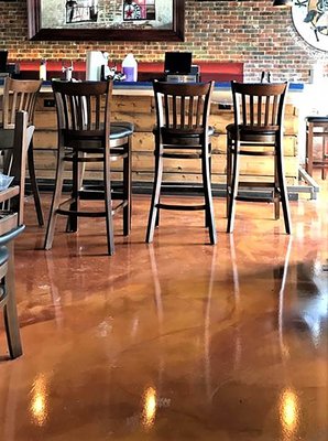 Commercial Epoxy Floor - Running a business means dealing with heavy foot traffic, spills, and equipment use daily. For commercial spaces, floors need to do more than look good—they need to hold up under pressure. That’s where commercial epoxy flooring becomes an invaluable investment. At GarageFloorCoating.com, we offer a durable, low-maintenance solution designed to meet the high demands of your business.
Benefits of Epoxy Floors in Your Business
Here’s why commercial epoxy flooring is a smart choice:
Durability: With the constant flow of customers, employees, and equipment, commercial spaces need a floor that can handle the load. Epoxy floors are highly resistant to wear and tear, impacts, and chemicals, meaning they’re built to last.
Easy Maintenance: One of the biggest advantages of epoxy flooring is that it’s incredibly easy to clean. Epoxy’s non-porous surface prevents stains and keeps spills from penetrating the floor, making it ideal for businesses where cleanliness is essential. Quick and simple cleaning helps reduce maintenance costs over time.
Customizable to Your Brand: No two businesses are alike, and neither are their aesthetics. Whether you manage a retail store, office, or restaurant, our epoxy floors come in a variety of finishes—ranging from sleek, high-gloss designs to more understated matte options—ensuring the floor complements your business’s style and image. Stunning Aesthetics: Epoxy flooring simply gives the customer a better experience as they walk through your business. The literal ground they stand on is beautiful, which we think is a great place to start. Commercial Epoxy Floor - Running a business means dealing with heavy foot traffic, spills, and equipment use daily. For commercial spaces, floors need to do more than look good—they need to hold up under pressure. That’s where commercial epoxy flooring becomes an invaluable investment. At GarageFloorCoating.com, we offer a durable, low-maintenance solution designed to meet the high demands of your business.
Benefits of Epoxy Floors in Your Business
Here’s why commercial epoxy flooring is a smart choice:
Durability: With the constant flow of customers, employees, and equipment, commercial spaces need a floor that can handle the load. Epoxy floors are highly resistant to wear and tear, impacts, and chemicals, meaning they’re built to last.
Easy Maintenance: One of the biggest advantages of epoxy flooring is that it’s incredibly easy to clean. Epoxy’s non-porous surface prevents stains and keeps spills from penetrating the floor, making it ideal for businesses where cleanliness is essential. Quick and simple cleaning helps reduce maintenance costs over time.
Customizable to Your Brand: No two businesses are alike, and neither are their aesthetics. Whether you manage a retail store, office, or restaurant, our epoxy floors come in a variety of finishes—ranging from sleek, high-gloss designs to more understated matte options—ensuring the floor complements your business’s style and image. Stunning Aesthetics: Epoxy flooring simply gives the customer a better experience as they walk through your business. The literal ground they stand on is beautiful, which we think is a great place to start.