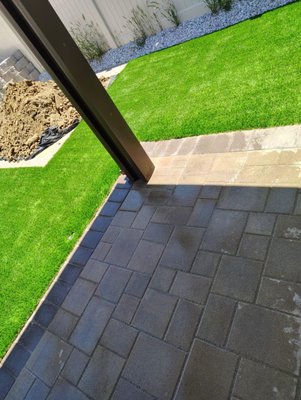 Pavers Installation - Artificial grass and pavers transformation for energy efficient long lasting materials