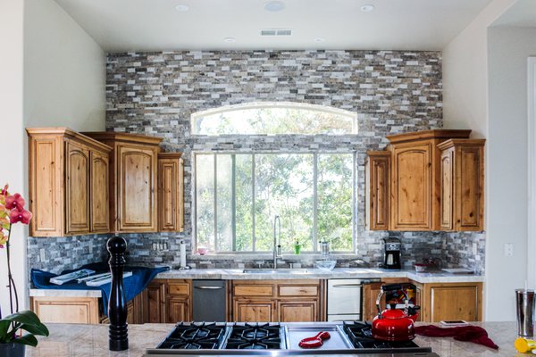 2 Kitchen remodel Roseville - Stacked stone backsplash finished perfectly.
