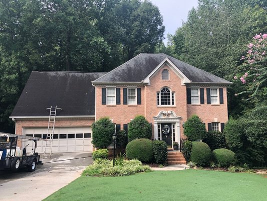 Roof cleaning - 6 year old roof was covered in black algae.  Roof was cleaned with our Aqua Wave Softwash solution and looks new again, reduces heat in the attic, and added curb appeal.