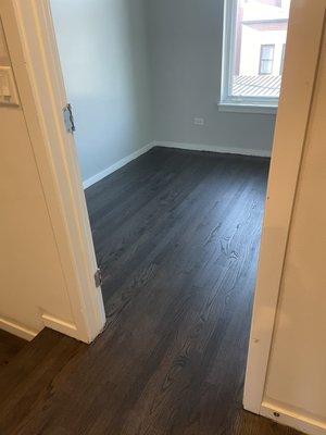 Refinishing hardwood floors with satin finish - This is an existing floors we refinished it and apply stain with 3 coats varnish water base satin finish. Refinishing hardwood floors with satin finish - This is an existing floors we refinished it and apply stain with 3 coats varnish water base satin finish.
