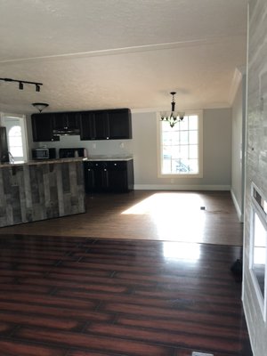 Remodel Mobile Home - Demo kitchen, fresh paint, new windows, install baseboards and crowns molding.