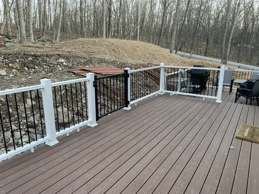 Deck and railing replacement - This deck was replaced with new composite decking and vinyl and metal railings Deck and railing replacement - This deck was replaced with new composite decking and vinyl and metal railings