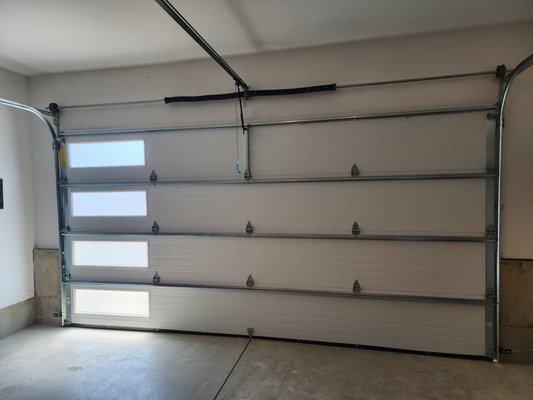 Wood Grain Door - This was a new door install it is a insulated door with frosted insulated windows up the side (can have windows on either side) Wood Grain Door - This was a new door install it is a insulated door with frosted insulated windows up the side (can have windows on either side)