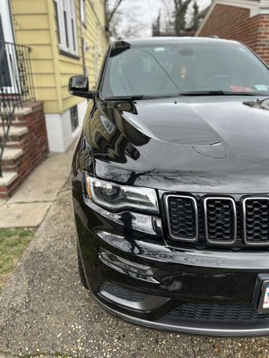Ceramic Protection - This Jeep received my premium 5-year ceramic coating package for long-term protection and an unbeatable shine. I  started with a deep decontamination wash, including iron removal and clay bar treatment to eliminate embedded contaminants from the paint surface.

Next, I performed a single-stage paint enhancement to remove minor swirls and bring out a deep gloss, ensuring the surface was perfectly prepped for coating. Once corrected and wiped down with an alcohol-based panel prep, I applied a high-quality 5-year ceramic coating to the paint, trim, and lights.

The result? A glossy, ultra-slick surface that’s resistant to UV rays, chemicals, dirt, and water—making future washes faster and easier while preserving that freshly-detailed look year-round.