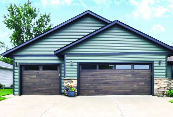 2025 Replacement Projects - Model 5740 is the ideal choice for homeowners who want a garage door that offers both style, flexibility and exceptional performance. With an extensive range of panel designs and color options, this model allows you to choose the perfect door to match your home's architecture and curb appeal. Additionally, window options are available to add both natural light and beauty to your garage. 2025 Replacement Projects - Model 5740 is the ideal choice for homeowners who want a garage door that offers both style, flexibility and exceptional performance. With an extensive range of panel designs and color options, this model allows you to choose the perfect door to match your home's architecture and curb appeal. Additionally, window options are available to add both natural light and beauty to your garage.