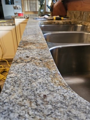 countertops restoration - Crack at the sink caused by metal rod countertops restoration - Crack at the sink caused by metal rod