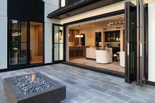Bi Fold Glass wall doors - Bi fold glass windows showcasing connecting the interior to the exterior. Bi Fold Glass wall doors - Bi fold glass windows showcasing connecting the interior to the exterior.