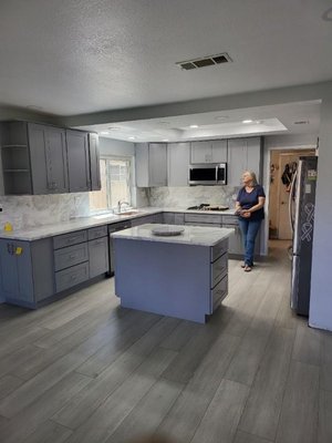 Custom Kitchen Remodel in San Diego - We had the opportunity to work on a beautiful home where the owners wanted to transform their outdated kitchen into a modern and functional space.
From start to finish, the project took approximately 14 days to complete. We began by collaborating closely with the homeowners to understand their vision and requirements. They wanted sleek and contemporary cabinets that maximized storage space and provided easy access to their cookware and utensils.
Once we finalized the design, our team got to work. We carefully removed the existing cabinets, countertops, and backsplash to make way for the new elements. We then installed cabinets crafted from high-quality materials, which offered a perfect blend of aesthetics and durability.
To enhance the functionality of the kitchen, we incorporated clever storage solutions like pull-out drawers, built-in spice racks, and specialized compartments for cutting boards and baking sheets. The cabinets were finished with a stunning, easy-to-clean surface that perfectly complemented the overall design.
In addition to the cabinets, we also upgraded the countertops with a luxurious quartz material and installed a stylish tile backsplash that added a touch of elegance. The homeowners were thrilled with the final result, as the new kitchen completely transformed the look and feel of their home.
Throughout the project, our team maintained open communication with the homeowners, providing regular updates and addressing any concerns promptly. We made sure to prioritize quality workmanship and attention to detail to ensure a seamless and visually appealing outcome.
Seeing the joy on our clients' faces when they saw their new kitchen was incredibly rewarding. It's projects like these that inspire us to continue delivering exceptional craftsmanship and customer satisfaction. If you have any specific questions about this project or would like to discuss your own kitchen remodel project further, feel free to ask — we're here to help! Custom Kitchen Remodel in San Diego - We had the opportunity to work on a beautiful home where the owners wanted to transform their outdated kitchen into a modern and functional space.
From start to finish, the project took approximately 14 days to complete. We began by collaborating closely with the homeowners to understand their vision and requirements. They wanted sleek and contemporary cabinets that maximized storage space and provided easy access to their cookware and utensils.
Once we finalized the design, our team got to work. We carefully removed the existing cabinets, countertops, and backsplash to make way for the new elements. We then installed cabinets crafted from high-quality materials, which offered a perfect blend of aesthetics and durability.
To enhance the functionality of the kitchen, we incorporated clever storage solutions like pull-out drawers, built-in spice racks, and specialized compartments for cutting boards and baking sheets. The cabinets were finished with a stunning, easy-to-clean surface that perfectly complemented the overall design.
In addition to the cabinets, we also upgraded the countertops with a luxurious quartz material and installed a stylish tile backsplash that added a touch of elegance. The homeowners were thrilled with the final result, as the new kitchen completely transformed the look and feel of their home.
Throughout the project, our team maintained open communication with the homeowners, providing regular updates and addressing any concerns promptly. We made sure to prioritize quality workmanship and attention to detail to ensure a seamless and visually appealing outcome.
Seeing the joy on our clients' faces when they saw their new kitchen was incredibly rewarding. It's projects like these that inspire us to continue delivering exceptional craftsmanship and customer satisfaction. If you have any specific questions about this project or would like to discuss your own kitchen remodel project further, feel free to ask — we're here to help!