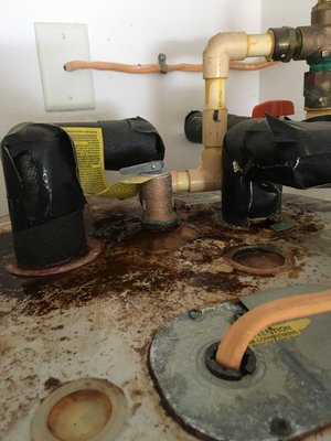 New water heater install - This is what the hot water heater looked like before and the new install completed New water heater install - This is what the hot water heater looked like before and the new install completed