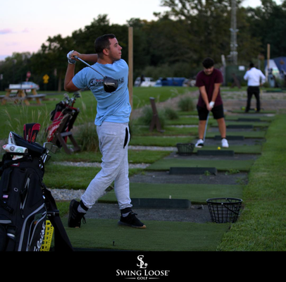 Outdoor Range - Experience the excitement of practicing your swing at our outdoor range, perfect for golfers of all skill levels! Outdoor Range - Experience the excitement of practicing your swing at our outdoor range, perfect for golfers of all skill levels!