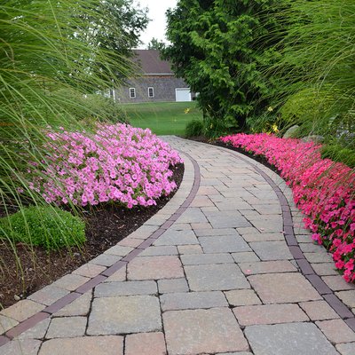 Full Service Landscaping - We performed all landscaping services for a school. This included paving, laying sod, grass seed, irrigation, retaining walls, and other install work. Full Service Landscaping - We performed all landscaping services for a school. This included paving, laying sod, grass seed, irrigation, retaining walls, and other install work.