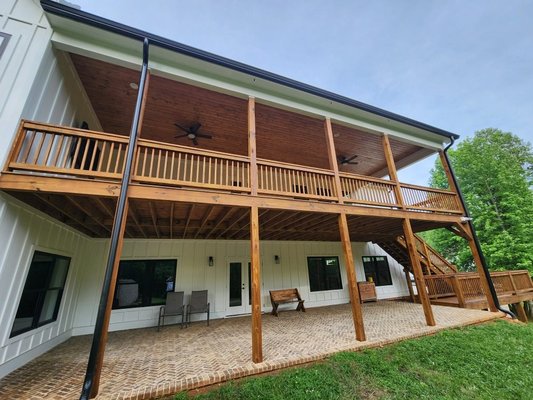 Exterior Stain & Paint Refresh - This project included staining the deck and stairs, along with a full exterior paint refresh. We matched the rich wood tones with a bold blue finish to give the home a clean, polished look that stands out while protecting every surface from the elements.