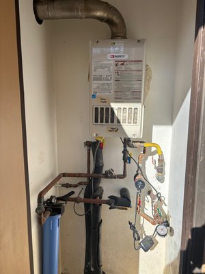 Navien Tankless Replacement - We remove an old inoperable tankless water heater with an outdated circulation system, and installed a new Navien tankless water heater with hot water recirculation. Customer is so grateful to now have instant hot water in their master bathroom on the opposite side of this 4000 square foot home. Navien Tankless Replacement - We remove an old inoperable tankless water heater with an outdated circulation system, and installed a new Navien tankless water heater with hot water recirculation. Customer is so grateful to now have instant hot water in their master bathroom on the opposite side of this 4000 square foot home.