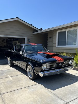 Plymouth Barracuda 2-year Ceramic Coating - When we were working on another car one day, a nice man walked up to us and inquired about his Barracuda. He initially wanted to just get a simple wax on his vehicle, until we found the he wanted to keep his car protected for a little longer than the wax is made for. We suggested our 2-year ceramic coating and a week later, we were in his drive way prepping the vehicle to receive it. Interested in getting the same thing done to your vehicle? Click "Request a Quote" and we'll get back to you within minutes!