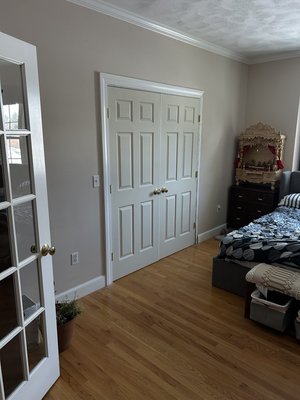 Double Door Installation - North Reading Bedroom - Full installation of heavy double doors in a bedroom. Both panels hung level and square within the existing frame, with proper clearance and smooth operation. Clean trim work completed around the frame for a finished look