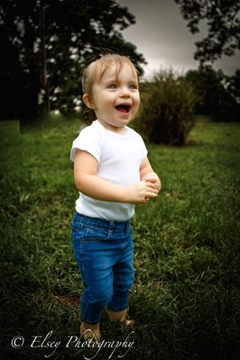 Rainy Day Fun - Little Miss Paityn enjoying a rainy day in her front yard. Rainy Day Fun - Little Miss Paityn enjoying a rainy day in her front yard.