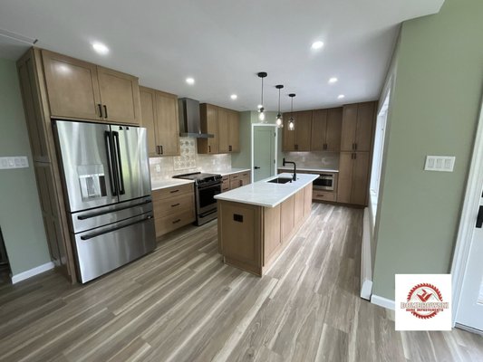 Bensalem Kitchen Remodel - We were brought back to our customer's home after completing a renovation project in their living room and foyer. We updated their 1990's era kitchen with new cabinets, quartz countertops, added a pantry, recessed lights, undercabinet lighting, vinyl plank flooring, a kitchen island and colors to bring their kitchen into the modern day. Bensalem Kitchen Remodel - We were brought back to our customer's home after completing a renovation project in their living room and foyer. We updated their 1990's era kitchen with new cabinets, quartz countertops, added a pantry, recessed lights, undercabinet lighting, vinyl plank flooring, a kitchen island and colors to bring their kitchen into the modern day.