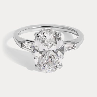 Taylor - Oval Brilliant Diamond Ring - Three Stone Ring with Tapered Baguette Diamonds in Platinum with Fully Rounded Band and High Polish Taylor - Oval Brilliant Diamond Ring - Three Stone Ring with Tapered Baguette Diamonds in Platinum with Fully Rounded Band and High Polish