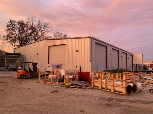 Concrete Repair & Metal Building Rehabilitation - Silver Spur Contractors performed multiple building improvement and site improvement projects for a local garbage recycler who was expanding its capabilities in a new area of recycling.
Over a 6 month period, we performed a complete rehabilitation of a dilapidated 10,000 sf metal building onsite including a significant upgrade to electrical services to the property to support a new recycling process and related heavy machinery. Building improvements included extending the existing concrete slab, installing new skins and industrial sized roll-up doors and a new roof with skylights, gutters and other accessories. After the building rehabilitation was completed using specifications provided by the customer, when the customer took delivery of a large piece of equipment to be housed inside the building, it was discovered that the equipment was too large for the building to accommodate. Silver Spur Contractors was called upon on an emergency basis to literally raise the roof in a large section to accommodate the unexpected additional height of the machinery as well as to create a covered expanded area on one wall to allow a conveyor to extrude through the side of the building.
During the building rehabilitation, we performed numerous site improvements to the existing facility including tearing out and replacing multiple areas of damaged concrete in the existing lot, saw cutting and replacing concrete around relocated electrical lines, constructing a new machine foundation, pouring new and expanding existing concrete ramps – several on an emergency basis, extending the existing office building slab, repairing the existing office sidewalk and paving, pouring concrete pedestals for existing equipment and more.
The majority of work was performed during normal business hours and Silver Spur Contractors was able to work around the customer’s existing operations, allowing the facility to continue to run uninterrupted – one of our specialties! Concrete Repair & Metal Building Rehabilitation - Silver Spur Contractors performed multiple building improvement and site improvement projects for a local garbage recycler who was expanding its capabilities in a new area of recycling.
Over a 6 month period, we performed a complete rehabilitation of a dilapidated 10,000 sf metal building onsite including a significant upgrade to electrical services to the property to support a new recycling process and related heavy machinery. Building improvements included extending the existing concrete slab, installing new skins and industrial sized roll-up doors and a new roof with skylights, gutters and other accessories. After the building rehabilitation was completed using specifications provided by the customer, when the customer took delivery of a large piece of equipment to be housed inside the building, it was discovered that the equipment was too large for the building to accommodate. Silver Spur Contractors was called upon on an emergency basis to literally raise the roof in a large section to accommodate the unexpected additional height of the machinery as well as to create a covered expanded area on one wall to allow a conveyor to extrude through the side of the building.
During the building rehabilitation, we performed numerous site improvements to the existing facility including tearing out and replacing multiple areas of damaged concrete in the existing lot, saw cutting and replacing concrete around relocated electrical lines, constructing a new machine foundation, pouring new and expanding existing concrete ramps – several on an emergency basis, extending the existing office building slab, repairing the existing office sidewalk and paving, pouring concrete pedestals for existing equipment and more.
The majority of work was performed during normal business hours and Silver Spur Contractors was able to work around the customer’s existing operations, allowing the facility to continue to run uninterrupted – one of our specialties!