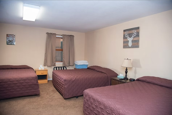 Triple - Sleeps 6 - Our most spacious room has 3 queen-size beds and sleeps up to 6 people comfortably.