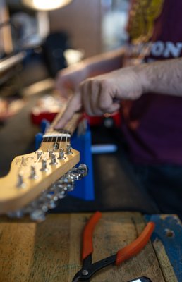 Guitar repair services - We are a full service repair shop for guitars, basses and mandolins. Services include setup, electronics repair, crack and bridge repair, refret and refinish.