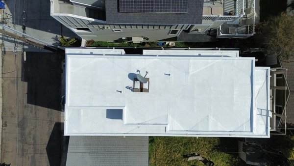 Reroofing Flat Roof - We recently completed a flat roof replacement project, utilizing high-quality TPO roofing membrane. The existing roof had deteriorated and was causing leaks, leading to water damage and potential structural issues. Reroofing Flat Roof - We recently completed a flat roof replacement project, utilizing high-quality TPO roofing membrane. The existing roof had deteriorated and was causing leaks, leading to water damage and potential structural issues.