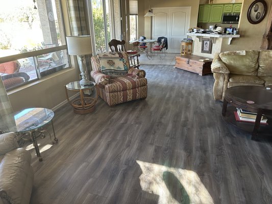 Made in the USA Laminate - This project was to replace carpeting with a laminate. This is a 10mm thick product with high-def grain technology producing an ultra realistic appearance and texture. It is a pet friendly product that is stain, scratch, and fade resistant. This product is made in the USA at a recently constructed factory built with the latest in manufacturing technology. Many people mistake this product for real hardwood. We won't tell :-) Made in the USA Laminate - This project was to replace carpeting with a laminate. This is a 10mm thick product with high-def grain technology producing an ultra realistic appearance and texture. It is a pet friendly product that is stain, scratch, and fade resistant. This product is made in the USA at a recently constructed factory built with the latest in manufacturing technology. Many people mistake this product for real hardwood. We won't tell :-)
