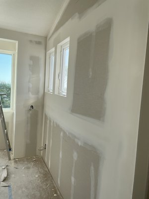 Linden - Sheetrock was installed, 3 coats of joint compound ( Tape, skim coat) Linden - Sheetrock was installed, 3 coats of joint compound ( Tape, skim coat)