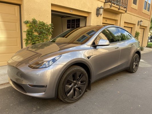 Ceramic Tint  - Model Y - New Model Y scheduled for ceramic tint. Client wanted high heat rejection with no tint darkness so as to not impede visibility. Client got 70% on the front windshield, 70% on two front windows and 70% over rear factory tint.