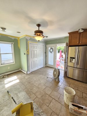 Kitchen repaint - The kitchen's original color had become dated so the client asked us for a repaint. We obliged as we refreshed the ceilings, repainted all the trim pieces and doors in semi-gloss, and finally repainted the walls Kitchen repaint - The kitchen's original color had become dated so the client asked us for a repaint. We obliged as we refreshed the ceilings, repainted all the trim pieces and doors in semi-gloss, and finally repainted the walls