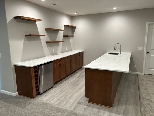 Wet bar addition in new construction home - Love to entertain? Let us build you a custom wet bar for easy, luxurious entertaining, and fast clean up with a built in sink! Wet bar addition in new construction home - Love to entertain? Let us build you a custom wet bar for easy, luxurious entertaining, and fast clean up with a built in sink!