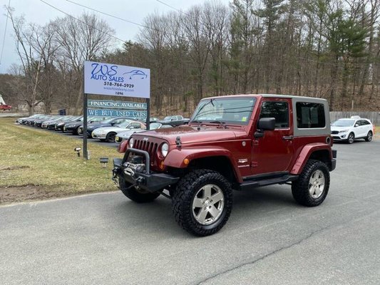 2009 Jeep Wrangler Sahara edition 4X4 - This 2009 Jeep Wrangler Sahara 4X4 has a CARFAX Buy Back Guarantee from WS Auto Sales so you can buy with confidence that there are no undisclosed history problems. Professionally detailed and in excellent physical and mechanical condition. This Jeep has the 3.8L V6 paired with a 6 Speed Manual Transmission. This Wrangler has a nice combination of added features with a Rancho Suspension Lift, Brand New 33" tires on 18" Alloy Wheels, Hard Top with removable Freedom Panels, Touch Screen Radio Display with USB and AUX inputs, Navigation System, Aftermarket Front Bumper with Smittybilt Winch, 4 Wheel Drive, and various other accessories. Financing and Extended Warranties Available. Please call (518) 764-5929 for more information and availability. 2009 Jeep Wrangler Sahara edition 4X4 - This 2009 Jeep Wrangler Sahara 4X4 has a CARFAX Buy Back Guarantee from WS Auto Sales so you can buy with confidence that there are no undisclosed history problems. Professionally detailed and in excellent physical and mechanical condition. This Jeep has the 3.8L V6 paired with a 6 Speed Manual Transmission. This Wrangler has a nice combination of added features with a Rancho Suspension Lift, Brand New 33" tires on 18" Alloy Wheels, Hard Top with removable Freedom Panels, Touch Screen Radio Display with USB and AUX inputs, Navigation System, Aftermarket Front Bumper with Smittybilt Winch, 4 Wheel Drive, and various other accessories. Financing and Extended Warranties Available. Please call (518) 764-5929 for more information and availability.