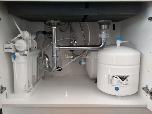 REVERSE OSMOSIS SYSTEMS - Reverse osmosis is a water purification process that uses a semi-permeable membrane to remove impurities, contaminants, and particles from water. It works by applying pressure to push water through the membrane, allowing only pure water molecules to pass while blocking larger molecules and contaminants. The result is a purified water stream on one side of the membrane and a concentrated solution with the removed impurities on the other side.
Reverse osmosis (RO) offers several benefits in water treatment:
Effective Contaminant Removal: RO is highly efficient at removing a wide range of contaminants, including minerals, salts, bacteria, viruses, and other impurities.
Improved Taste and Odor: The process enhances the taste and odor of water by removing dissolved substances that may affect its quality.
Reduced Salinity: RO is commonly used for desalination, reducing the salt content in seawater to make it suitable for drinking or agricultural purposes.
Space-Efficient: RO systems are typically compact and can be installed in various settings, making them suitable for residential, commercial, and industrial applications.
Conservation of Resources: RO helps in conserving water resources by providing a method for treating and reusing wastewater.
Versatility: It can be used for various purposes, including drinking water purification, wastewater treatment, and industrial processes.
Reliability: RO systems are reliable and can produce a consistent output of purified water when properly maintained. REVERSE OSMOSIS SYSTEMS - Reverse osmosis is a water purification process that uses a semi-permeable membrane to remove impurities, contaminants, and particles from water. It works by applying pressure to push water through the membrane, allowing only pure water molecules to pass while blocking larger molecules and contaminants. The result is a purified water stream on one side of the membrane and a concentrated solution with the removed impurities on the other side.
Reverse osmosis (RO) offers several benefits in water treatment:
Effective Contaminant Removal: RO is highly efficient at removing a wide range of contaminants, including minerals, salts, bacteria, viruses, and other impurities.
Improved Taste and Odor: The process enhances the taste and odor of water by removing dissolved substances that may affect its quality.
Reduced Salinity: RO is commonly used for desalination, reducing the salt content in seawater to make it suitable for drinking or agricultural purposes.
Space-Efficient: RO systems are typically compact and can be installed in various settings, making them suitable for residential, commercial, and industrial applications.
Conservation of Resources: RO helps in conserving water resources by providing a method for treating and reusing wastewater.
Versatility: It can be used for various purposes, including drinking water purification, wastewater treatment, and industrial processes.
Reliability: RO systems are reliable and can produce a consistent output of purified water when properly maintained.