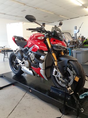 Installing a Akrapovic Exhaust on a 2020 Ducati Streetfighter v4 - We installed an Akrapovic exhaust on a brand new 2020 Ducati Street fighter V4. The Ducati dealer charges 16 hours to complete this installation. We only charge 10 hours! Installing a Akrapovic Exhaust on a 2020 Ducati Streetfighter v4 - We installed an Akrapovic exhaust on a brand new 2020 Ducati Street fighter V4. The Ducati dealer charges 16 hours to complete this installation. We only charge 10 hours!