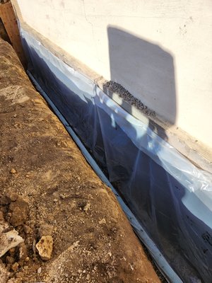 School Waterproofing & Masonry - This commercial restoration project highlights our expertise in waterproofing, masonry repair, and tuckpointing services. The scope included critical structural repairs, thorough foundation waterproofing, and precision tuckpointing to restore and protect the building’s brickwork. Our team installed professional-grade drainage and sealant systems to manage water intrusion, ensuring long-term durability and protection against the elements.

Throughout the project, we maintained strict safety protocols and delivered clean, detailed workmanship tailored to the needs of a commercial structure. These photos capture the transformation — from deteriorated masonry and leaking walls to a structurally sound and visually restored building exterior.