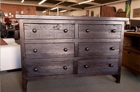 Reclaimed Wood - While the more contemporary style of furniture involves a lot of iron, steel, and glass, there's nothing quite like the classics! Wooden furniture has existed for millennia, and it will continue to do so thanks to the wide availability of wood. With Interiors Made Eezzy, you can custom-build your own wooden furniture exactly the way you want it.

Our showroom is filled with a wide variety of wooden furniture, but for the more discerning client, there's nothing better than custom-made. You have the ability to choose everything from the type of wood used to the color of the wood finish to the furniture design and even down to the fabric used for the upholstery. What could be better than total control over the creation of your furniture?

You'll be happy to know that we care about the environment as much as you go! A large quantity of our wood is reclaimed, meaning it has been taken from old buildings and furniture, retreated, and re-finished to make it look as good as new. It has the beautiful appearance of aged wood, but without the weakness that comes from old, worn lumber. If you want durable and beautiful, it doesn't get better than this.

When you sit down with our craftsmen, you will describe exactly what you're looking for in a piece of furniture. We'll write down your list of specific sizes, shapes, colors, and comfort. You'll give us details on what wood you want to use, what type of finish you want, what style of furniture will match your home best, and the list goes on. We'll work with you to create the perfect furniture according to the picture you have in your head. Better still, bring us that picture you found on Pinterest or in a magazine, and we'll bring your design to life!

With Interiors Made Eezzy, you have unlimited design options. If you can think of it, we can build it. We'll sketch custom designs to give you an idea of what the couch will look like, or we'll help you with the concept of your design. We're not limited to only wood, but we'll use iron, zinc, and steel if it means your "dream furniture" can become a reality.

All of our materials are locally-sourced and made in the U.S., ensuring only the best quality for your furniture. Whether you want a more "industrial", rustic, classic, modern, or trendy style, we'll help you bring your perfect design to life!
