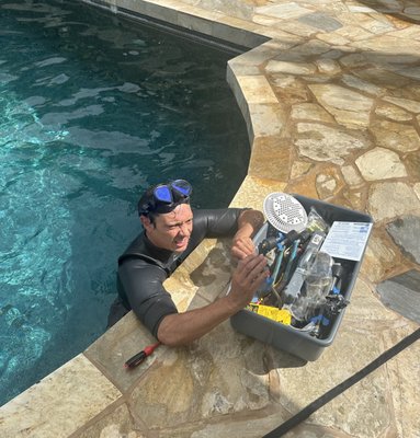 Pool Light Fix with No Pool Drain Pool Restoration - Aina Haina Oahu Hawaii - Project Overview
Neptune Pool and Spa Service completed a specialized pool restoration project in Aina Haina, Oahu Hawaii which included repairing the pool lights without the extensive process of draining the pool, a technique that saves time and conserves water.
Problem
The client's pool in Aina Haina was in need of restoration, with a particular issue being a malfunctioning underwater light. Typically, such a repair would necessitate draining the pool, which is costly and wasteful.
Solution
Leveraging our expertise in non-invasive repairs, we performed an in-water light fixture repair. By using waterproof equipment and our skilled dive team, we were able to access and fix the light fixture efficiently. The pool's aesthetics and safety were enhanced without the need for draining, exemplifying our commitment to innovative and eco-friendly service solutions. Pool Light Fix with No Pool Drain Pool Restoration - Aina Haina Oahu Hawaii - Project Overview
Neptune Pool and Spa Service completed a specialized pool restoration project in Aina Haina, Oahu Hawaii which included repairing the pool lights without the extensive process of draining the pool, a technique that saves time and conserves water.
Problem
The client's pool in Aina Haina was in need of restoration, with a particular issue being a malfunctioning underwater light. Typically, such a repair would necessitate draining the pool, which is costly and wasteful.
Solution
Leveraging our expertise in non-invasive repairs, we performed an in-water light fixture repair. By using waterproof equipment and our skilled dive team, we were able to access and fix the light fixture efficiently. The pool's aesthetics and safety were enhanced without the need for draining, exemplifying our commitment to innovative and eco-friendly service solutions.
