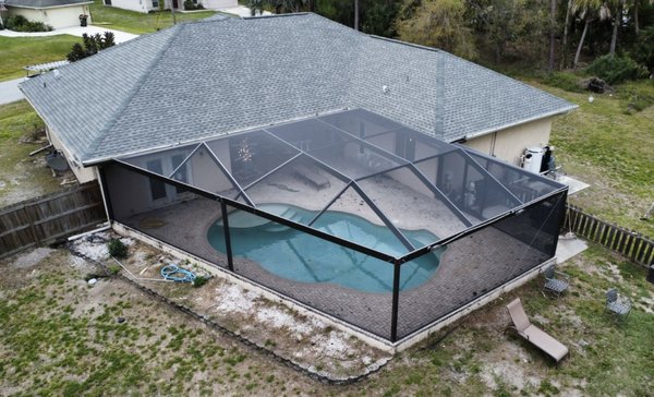 North Port Roof Replacement - This house sustained structural roof damage and the pool enclosure was completely demolished by Hurricane Ian. Jeff negotiated with the insurance company and the damage was completely covered. North Port Roof Replacement - This house sustained structural roof damage and the pool enclosure was completely demolished by Hurricane Ian. Jeff negotiated with the insurance company and the damage was completely covered.