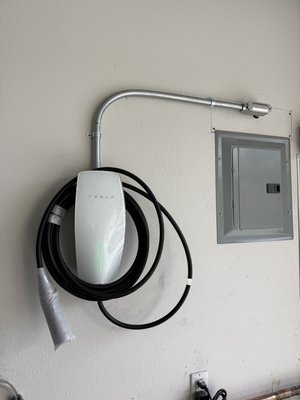 Tesla charger installation - Popular task - adding Tesla charger to garage. With Tesla charger owner has benefits - increased charging current, faster charge. For NEMA 14-50 outlet you can use 50A breaker max. For the hardwired Tesla charger you can use 60A breaker. Tesla charger installation - Popular task - adding Tesla charger to garage. With Tesla charger owner has benefits - increased charging current, faster charge. For NEMA 14-50 outlet you can use 50A breaker max. For the hardwired Tesla charger you can use 60A breaker.