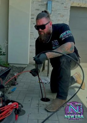 Drain Cleaning - Drain Cleaning Services in Mesa, AZ
Reliable, Professional, and Affordable Drain Cleaning Solutions
If you’re dealing with slow drains, recurring clogs, or foul odors coming from your pipes, it’s time to call New Era Plumbing LLC for expert drain cleaning services in Mesa, AZ. Clogged drains can quickly turn into a major headache, leading to water damage, pipe corrosion, and even sewage backups. Our licensed plumbers use the latest technology to clear blockages, remove buildup, and restore your plumbing system efficiently.

 

We offer fast, reliable, and affordable drain cleaning services for both residential and commercial properties in Mesa and surrounding areas. Whether you have a kitchen sink backup, a clogged shower drain, or a main sewer line obstruction, we have the right tools and expertise to fix it—guaranteed.