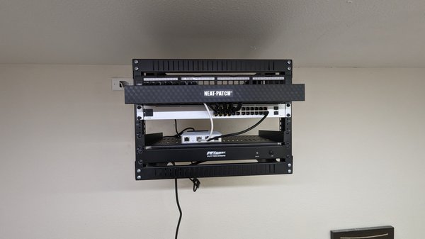 Network installation - We removed old cabling from a Senior living facility, relocated the original MPOE to the inside of the building, and upgraded the current infrastructure from an old 10/100 speed to a 1Gigabit network. 
The installation took over 5 days to be completed on both floors.

All the new equipment was tested and tailored to the customer's needs.

We worked with a local electrician to relocate power to the top of the rack minimizing cable exposure.