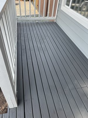 Front porch solid stain - Front porch repair 

Scrap old peeling paint 
Sanded porch 
Apply two Coats of solid stain